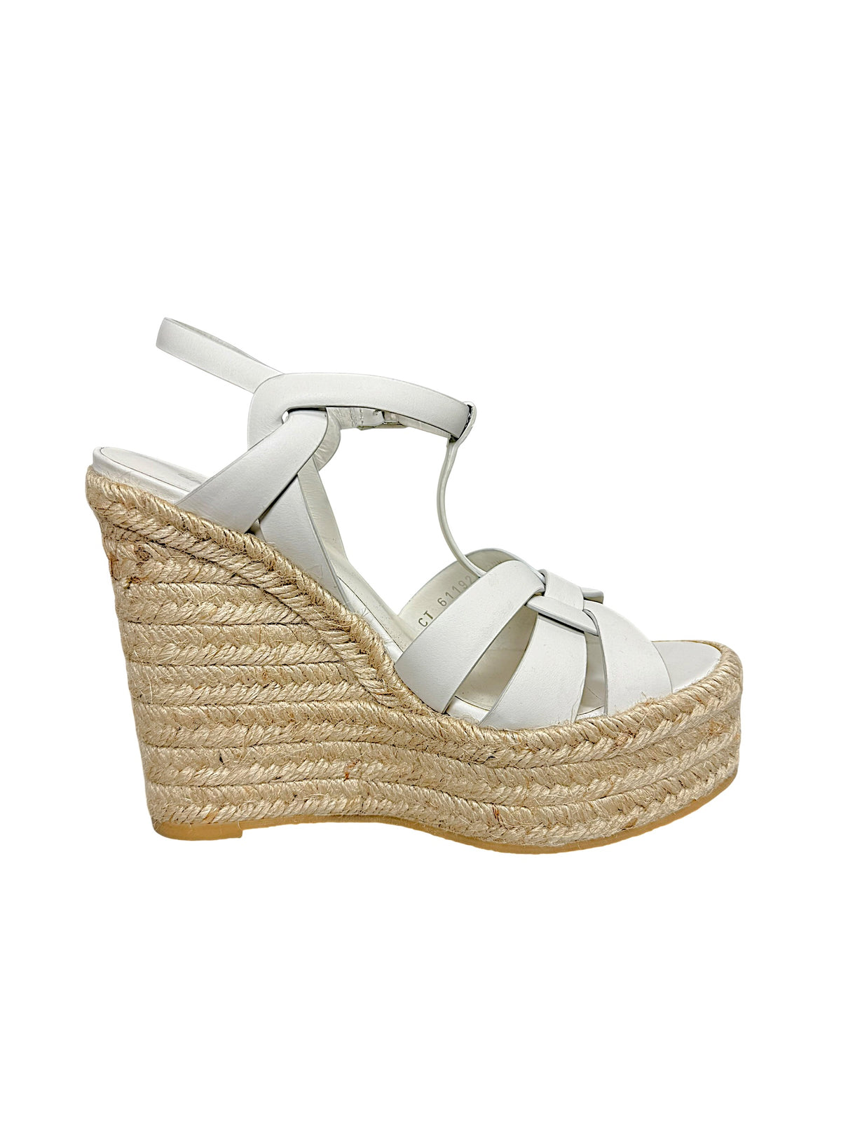Profile view of Saint Laurent Tribute white leather espadrille platform wedge sandal with interwoven straps and natural jute wedge