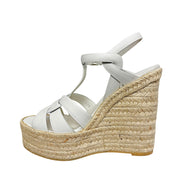 Saint Laurent Tribute white leather espadrille wedge sandal side view showing ankle buckle, T-strap and braided jute construction