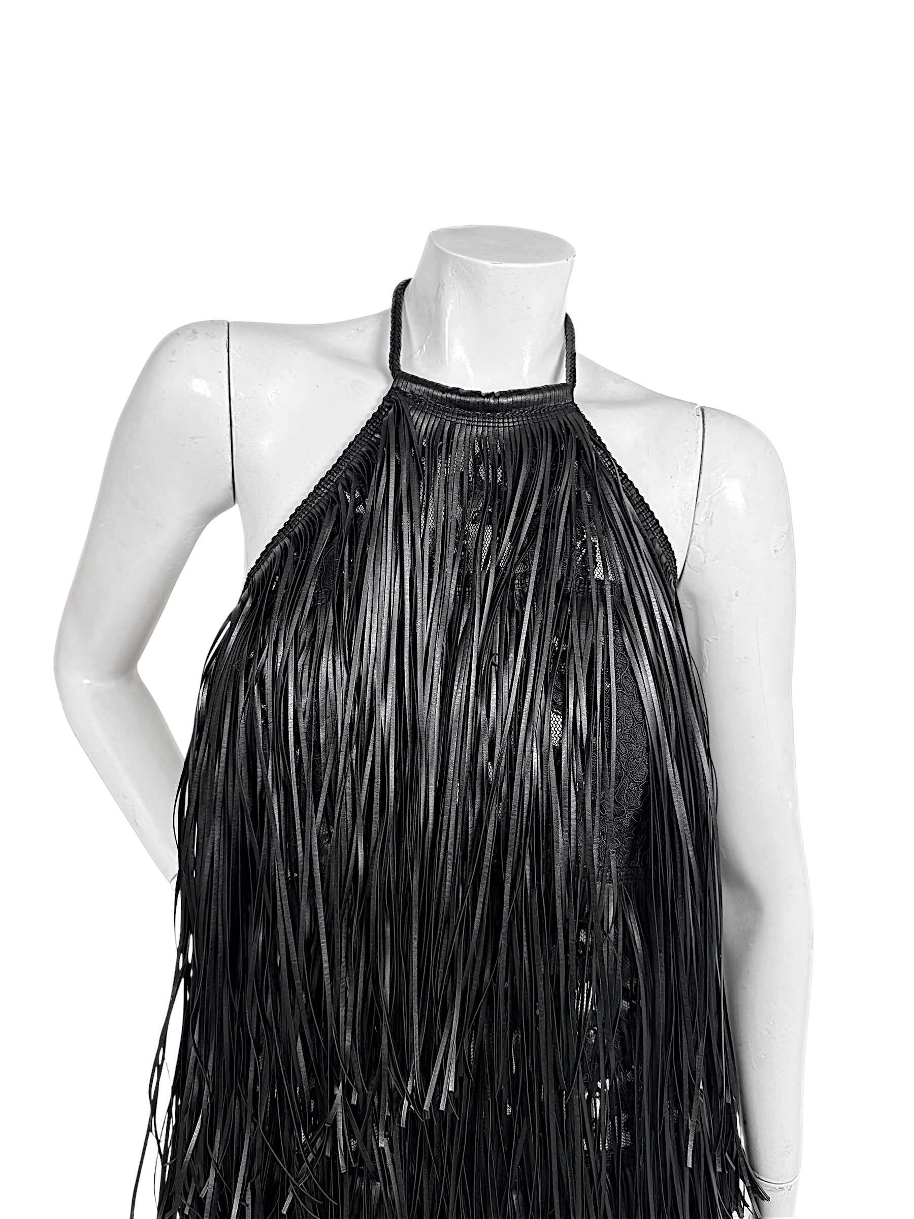 Close-up of Silvia Tcherassi Susa black fringe dress showing halter neckline, lace and layered fringe