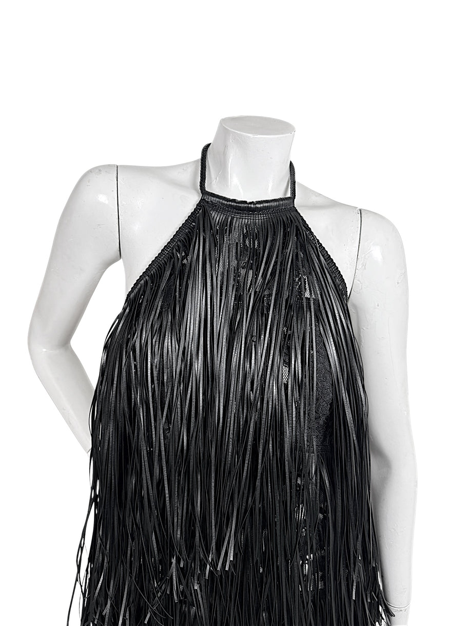 Close-up of Silvia Tcherassi Susa black fringe dress showing halter neckline, lace and layered fringe