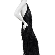 Side view of Silvia Tcherassi Susa black fringe halter dress showing open-back silhouette