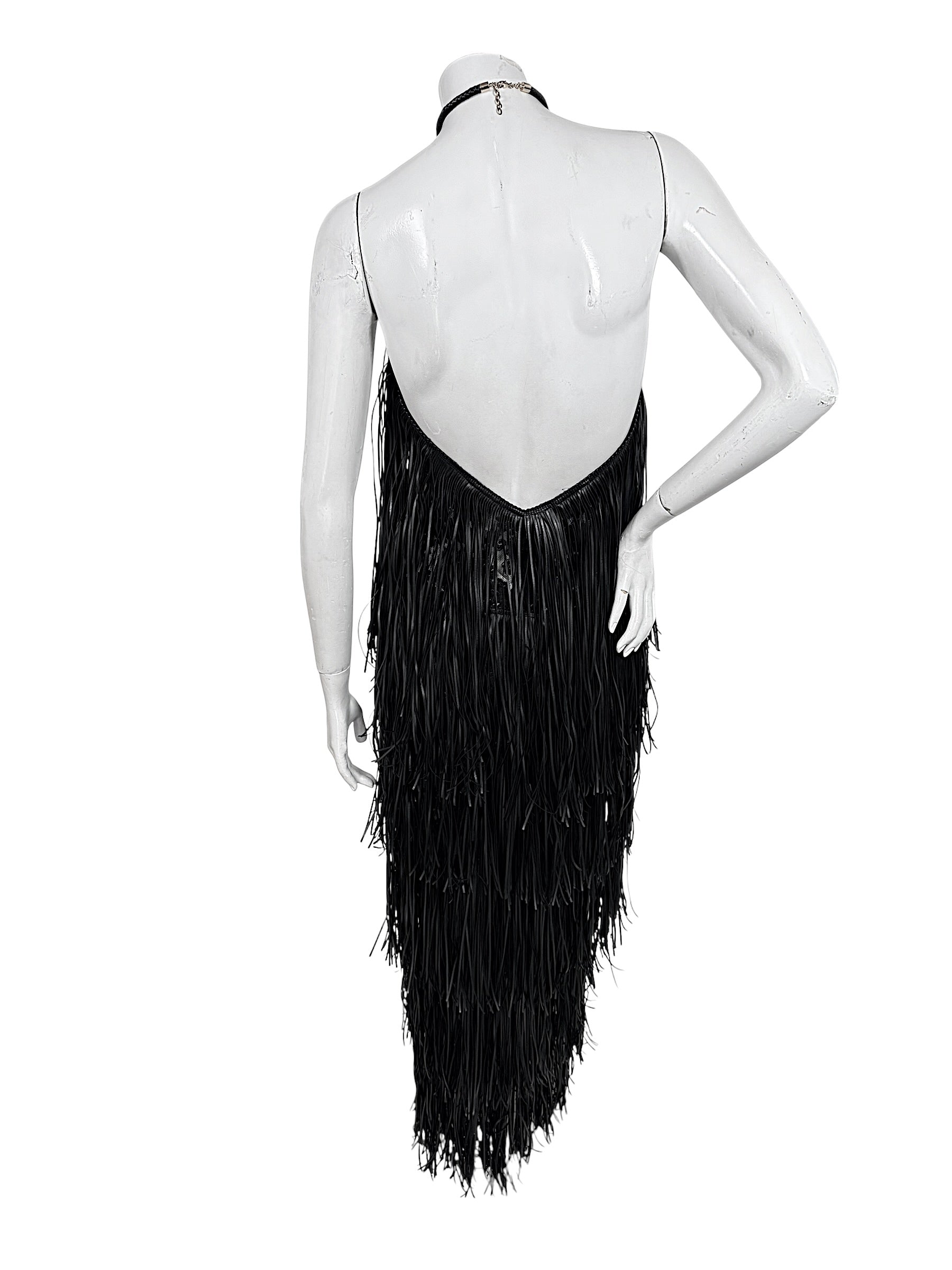 Back view of Silvia Tcherassi Resort 2024 Look 12 Susa dress with dramatic low open back and fringe