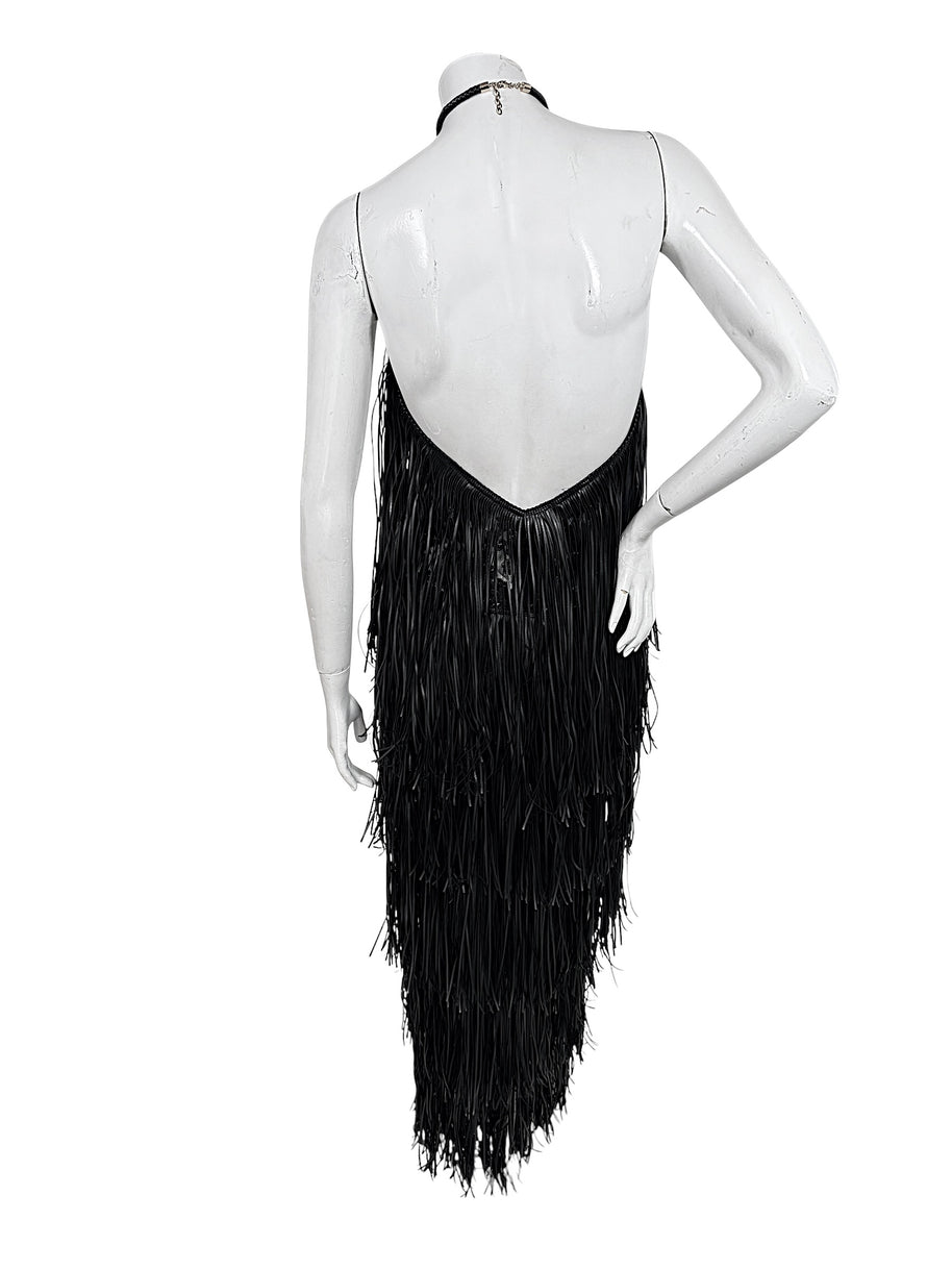 Back view of Silvia Tcherassi Resort 2024 Look 12 Susa dress with dramatic low open back and fringe