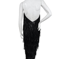 Back view of Silvia Tcherassi Resort 2024 Look 12 Susa dress with dramatic low open back and fringe