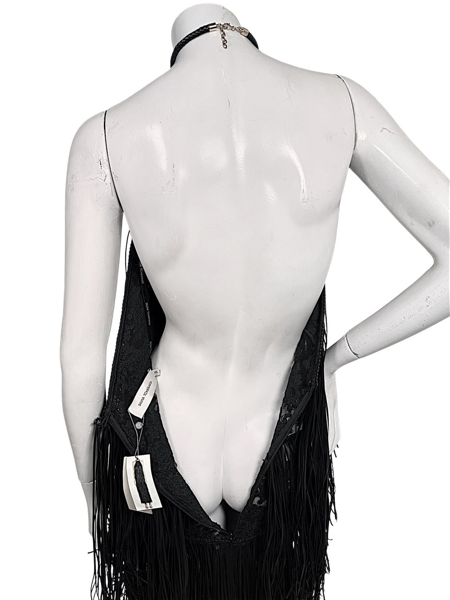 Close-up back view of Silvia Tcherassi Susa Resort 2024 dress showing plunging open back and halter closure