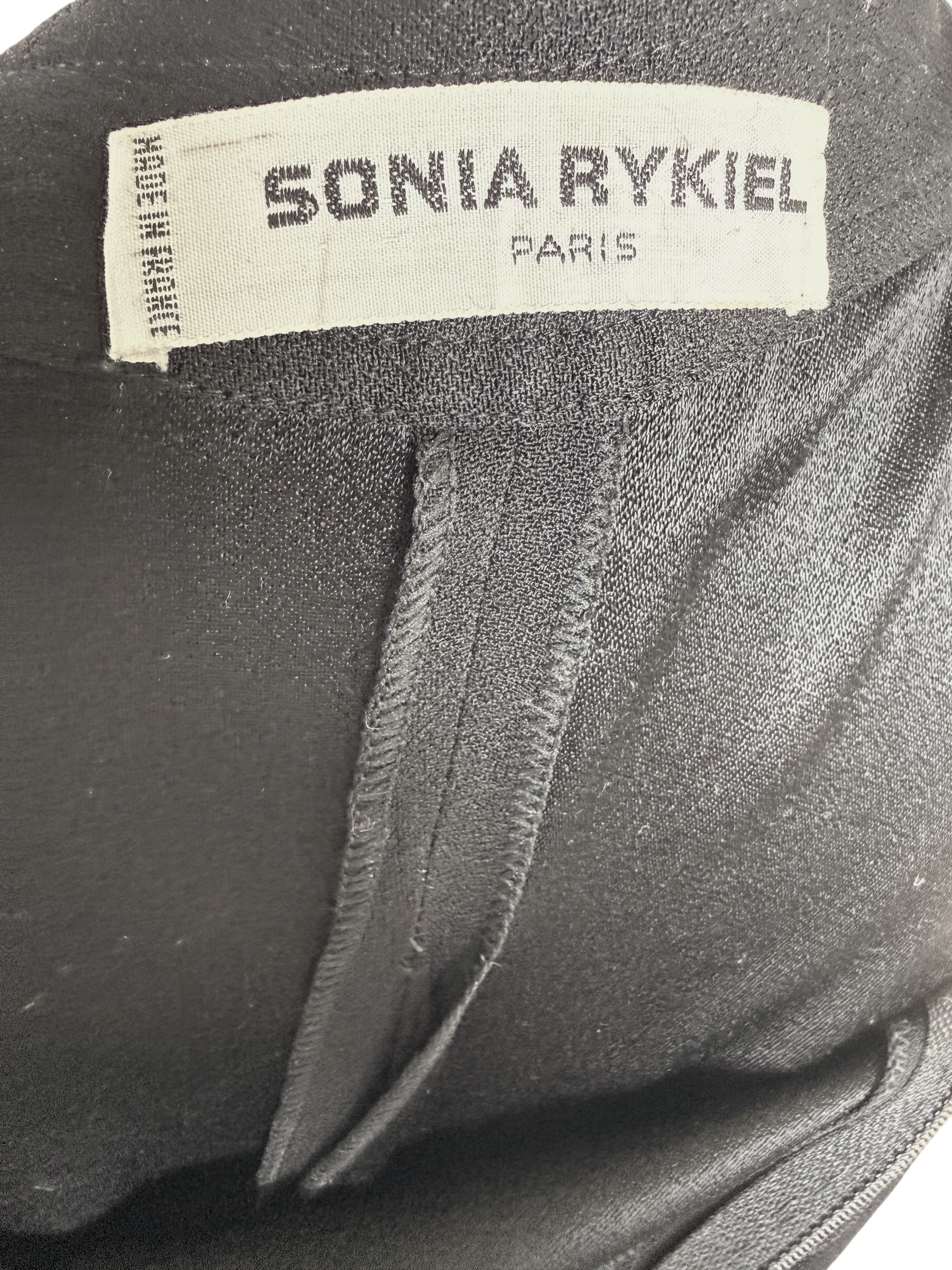 Close-up photograph of the original Sonia Rykiel Paris woven label used on vintage French designer garments.