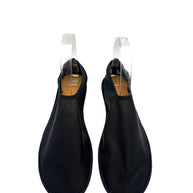 Front top view of The Row black sheer mesh sock shoes, size EU 38, showing rounded toe shape, streamlined uppers and slip-on openings.