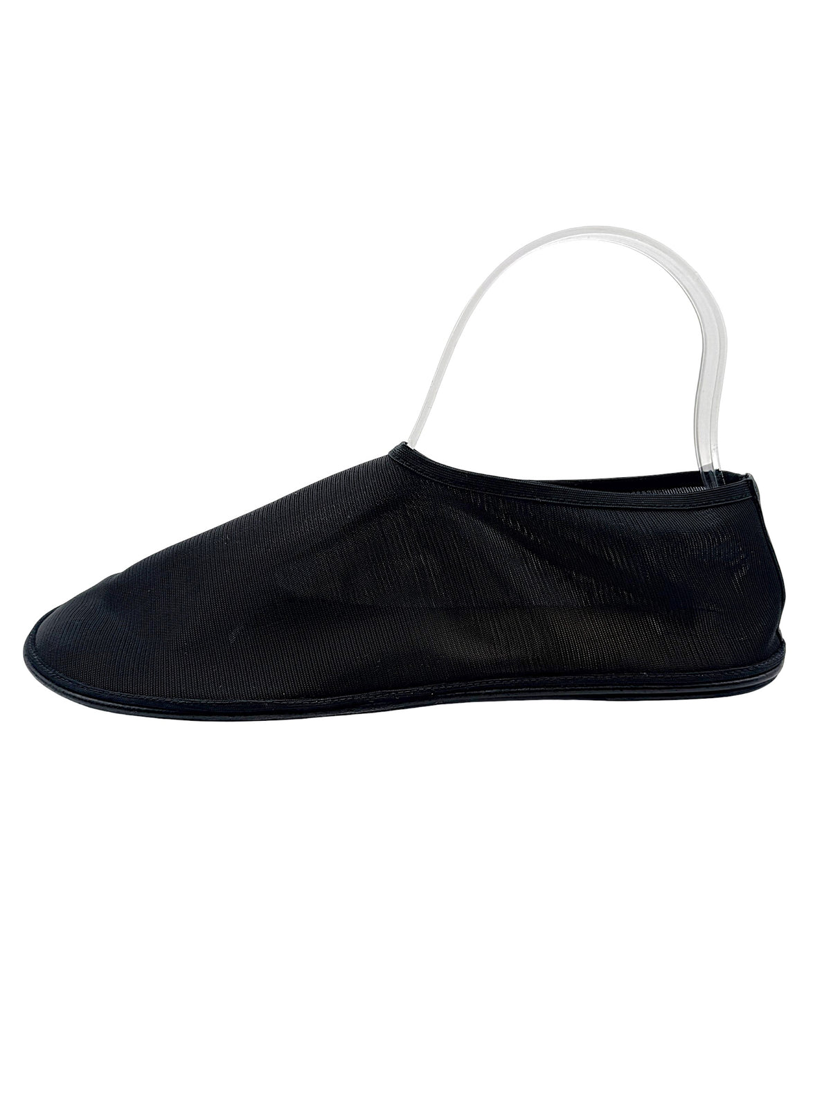 Lateral side view of The Row women's black mesh sock ballet flat, highlighting the lightweight sheer upper, rounded toe and low-profile sole.