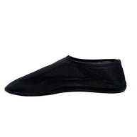 Opposite side view of The Row black mesh sock shoe in EU 38, displaying semi-sheer ribbed nylon construction and minimalist flat silhouette.
