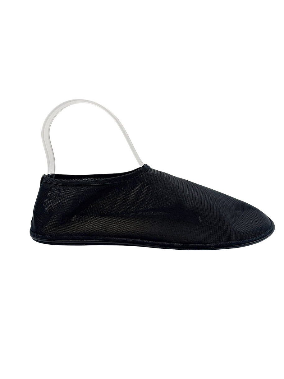 Front top view of The Row black sheer mesh sock shoes, size EU 38, showing rounded toe shape, streamlined uppers and slip-on openings.