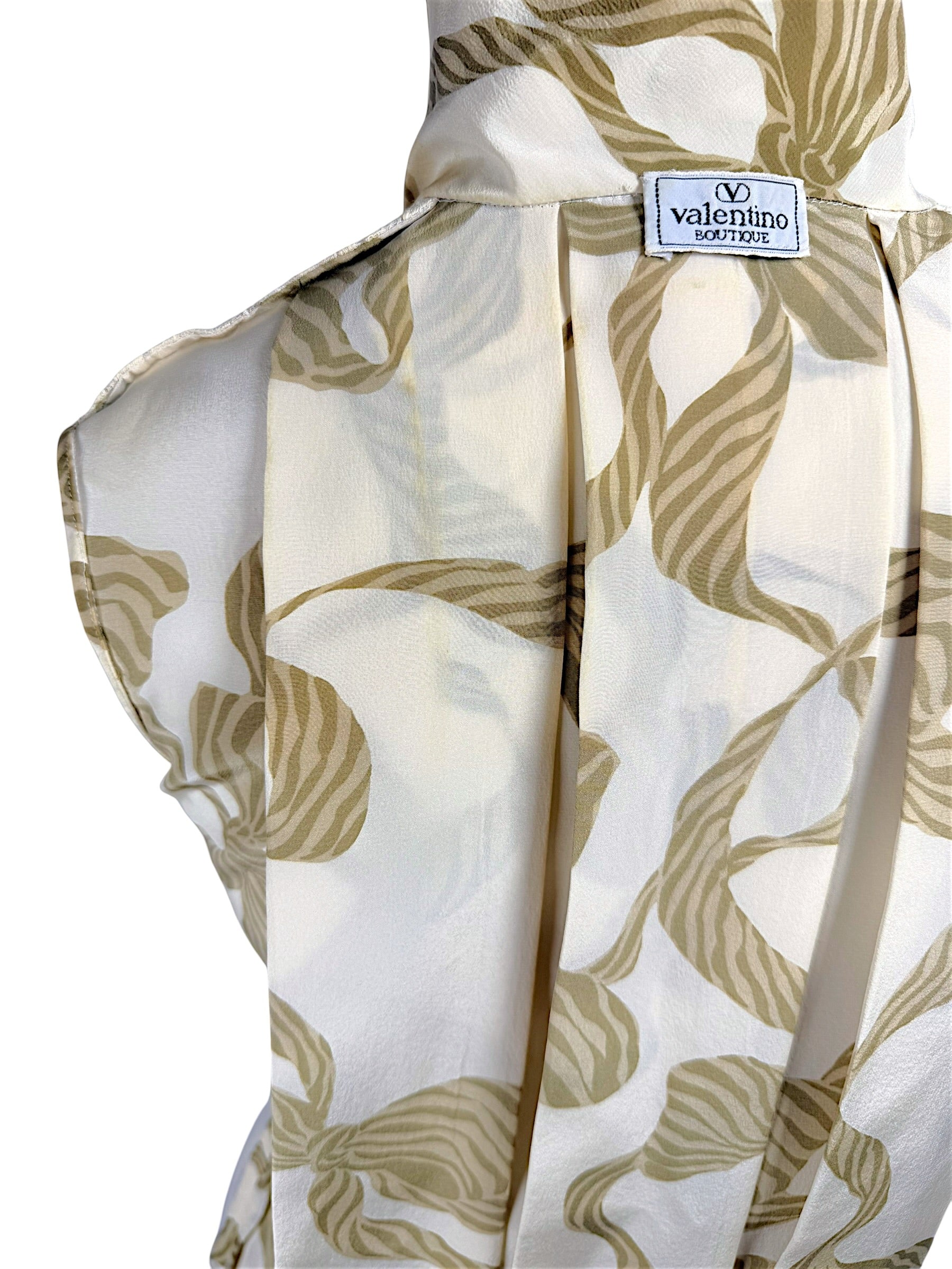 Valentino Boutique label on silk blouse collar close up