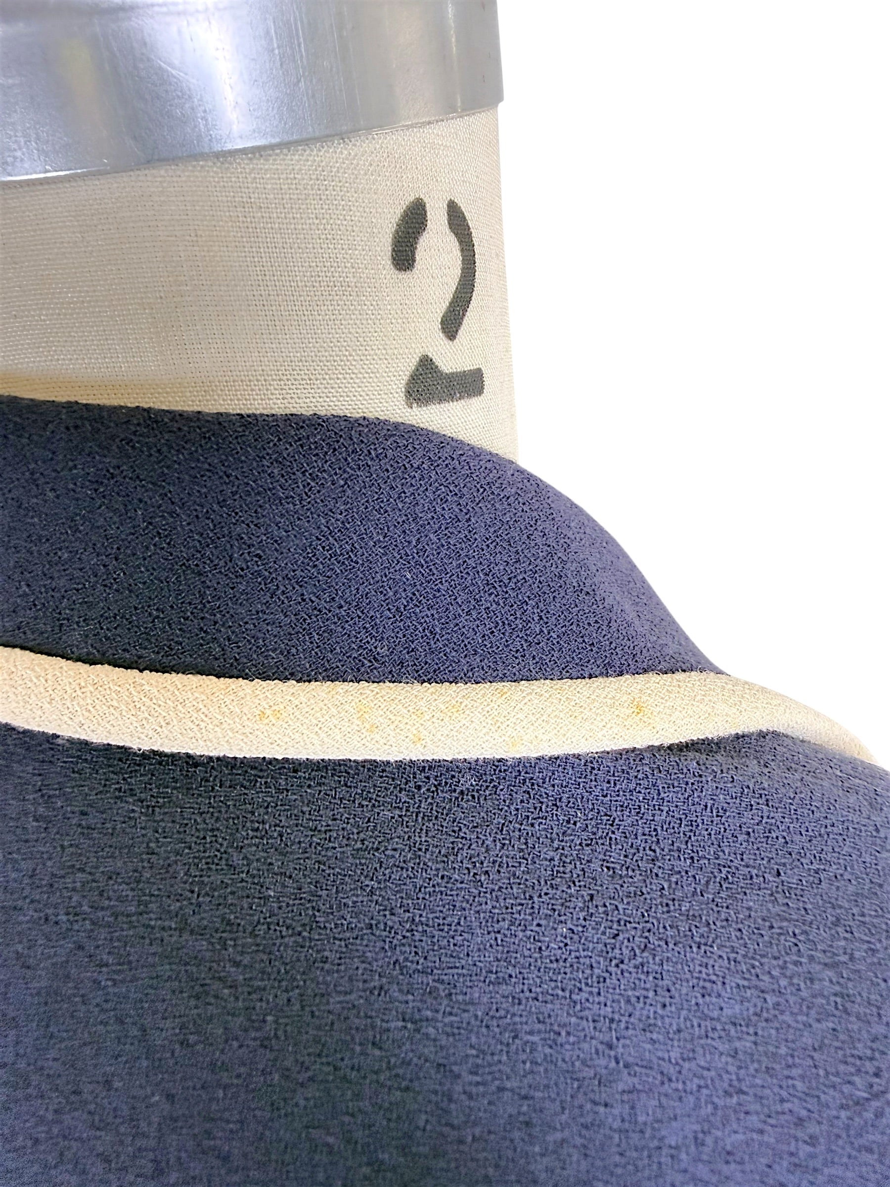 Close-up of light soiling on ivory collar trim of vintage Valentino blazer