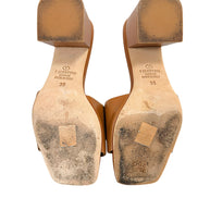 Valentino Garavani VLogo sandals leather outsoles showing wear consistent with previous use