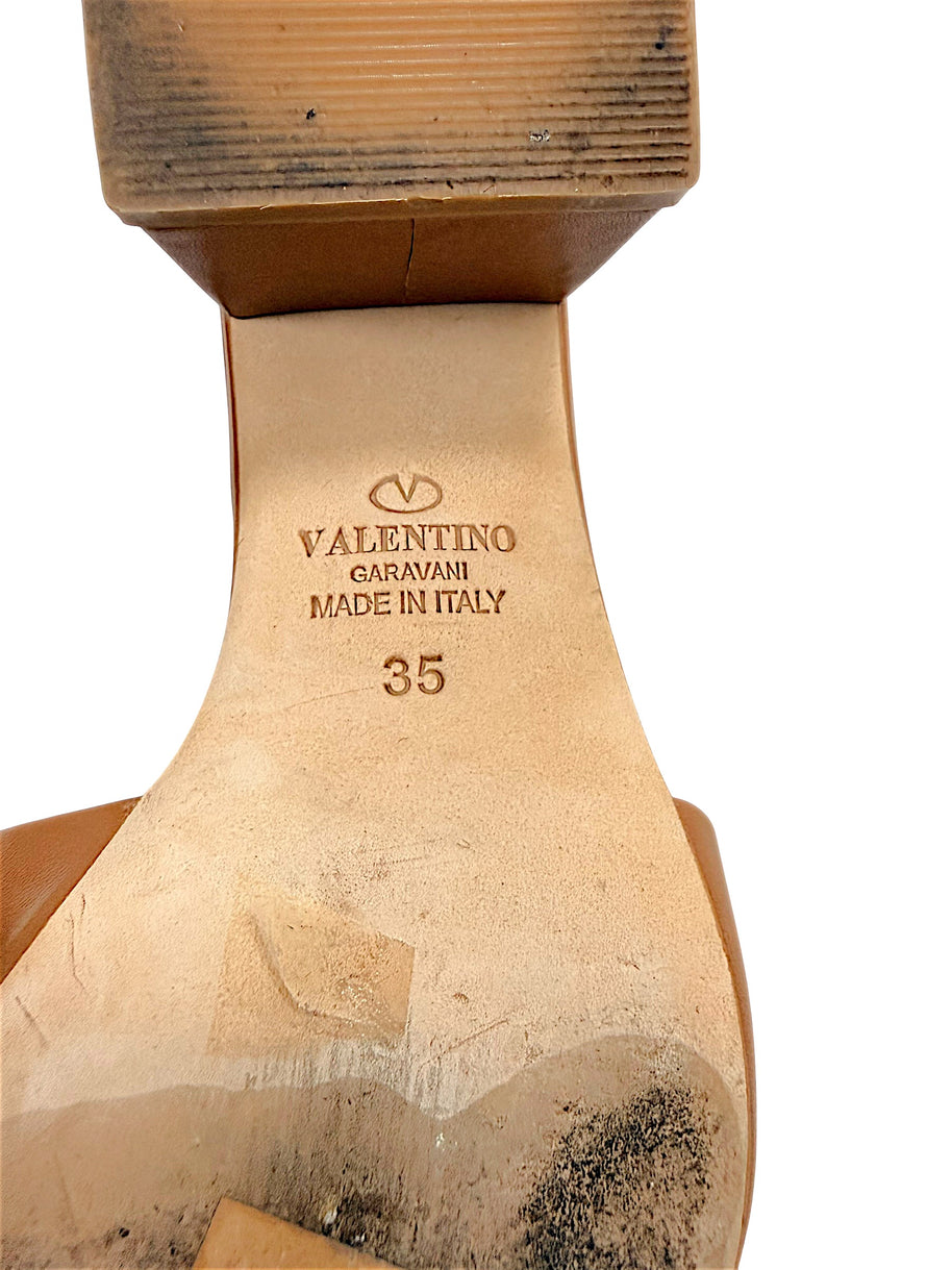 Valentino Garavani sandal outsole stamp showing Made in Italy and EU size 35