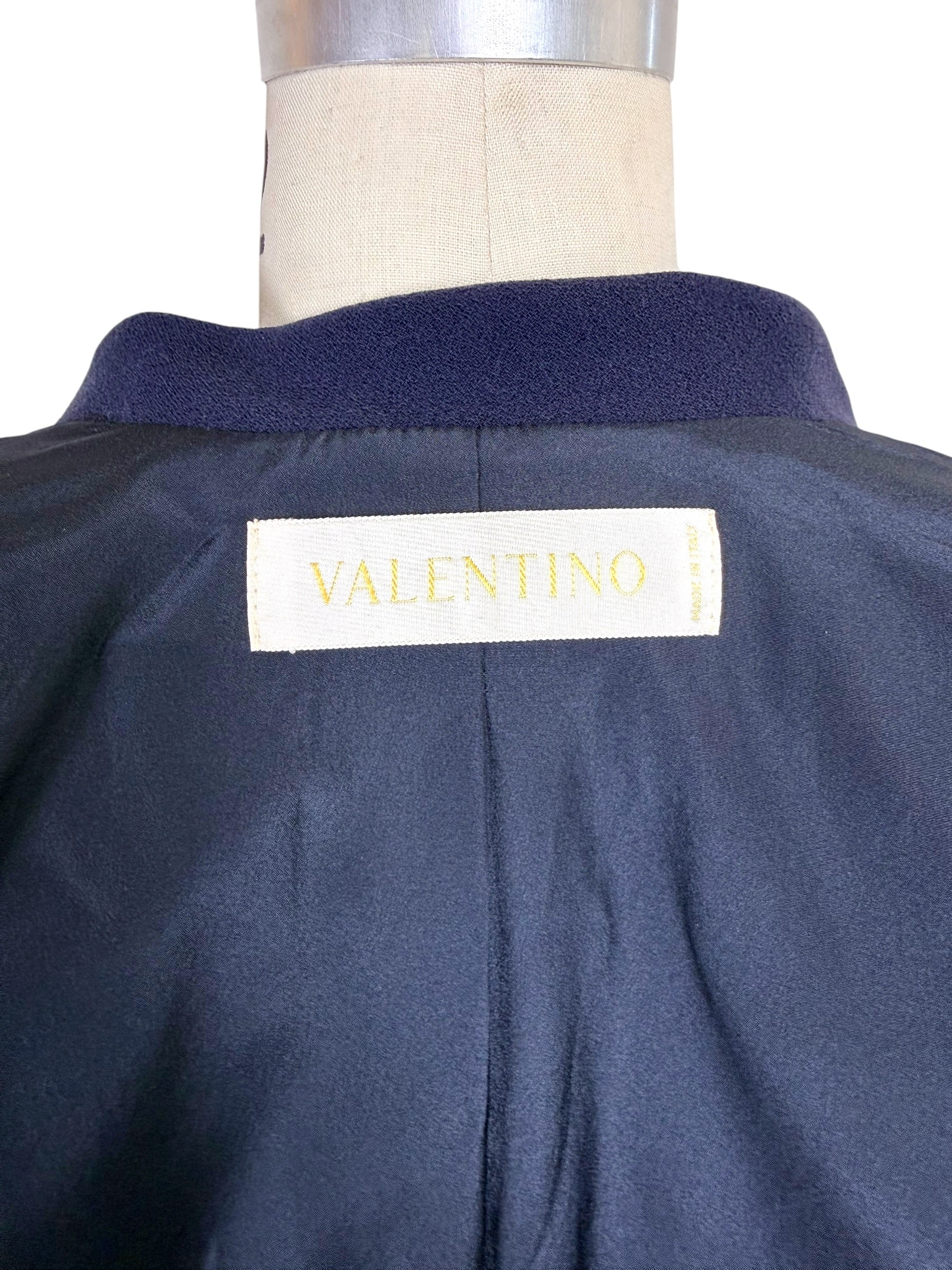 Interior Valentino designer label inside vintage navy blazer