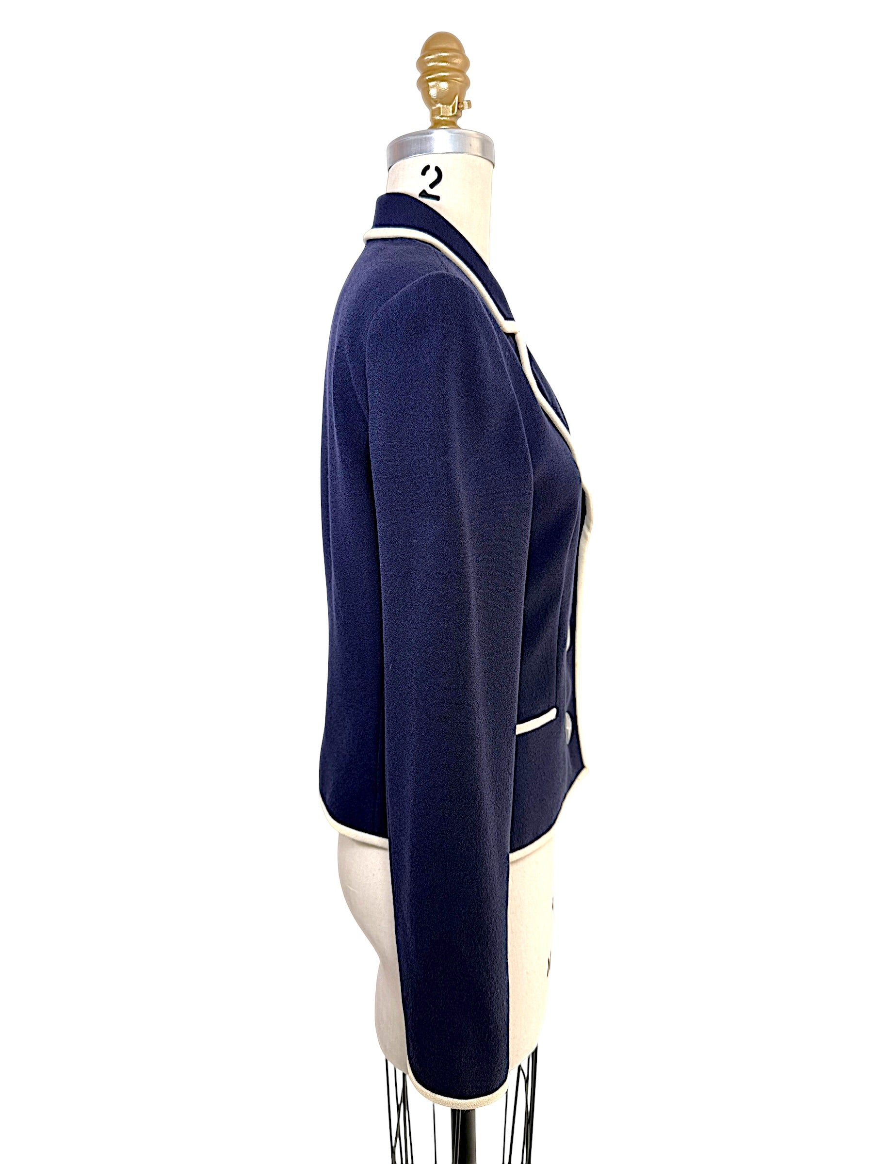 Side profile of vintage Valentino navy tailored blazer with ivory piping