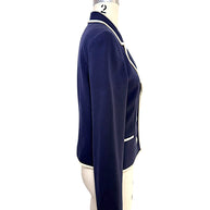 Side profile of vintage Valentino navy tailored blazer with ivory piping