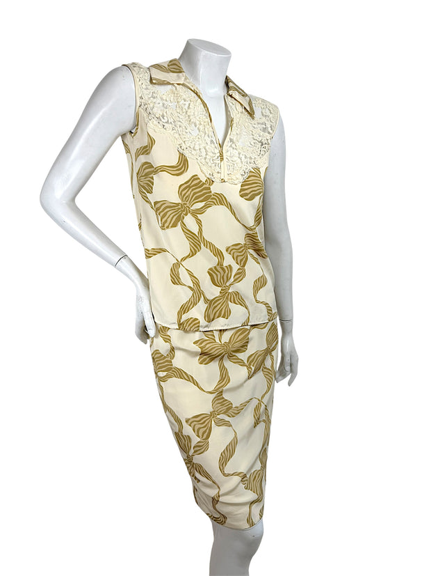 Valentino ivory silk two piece set angled front view bow print