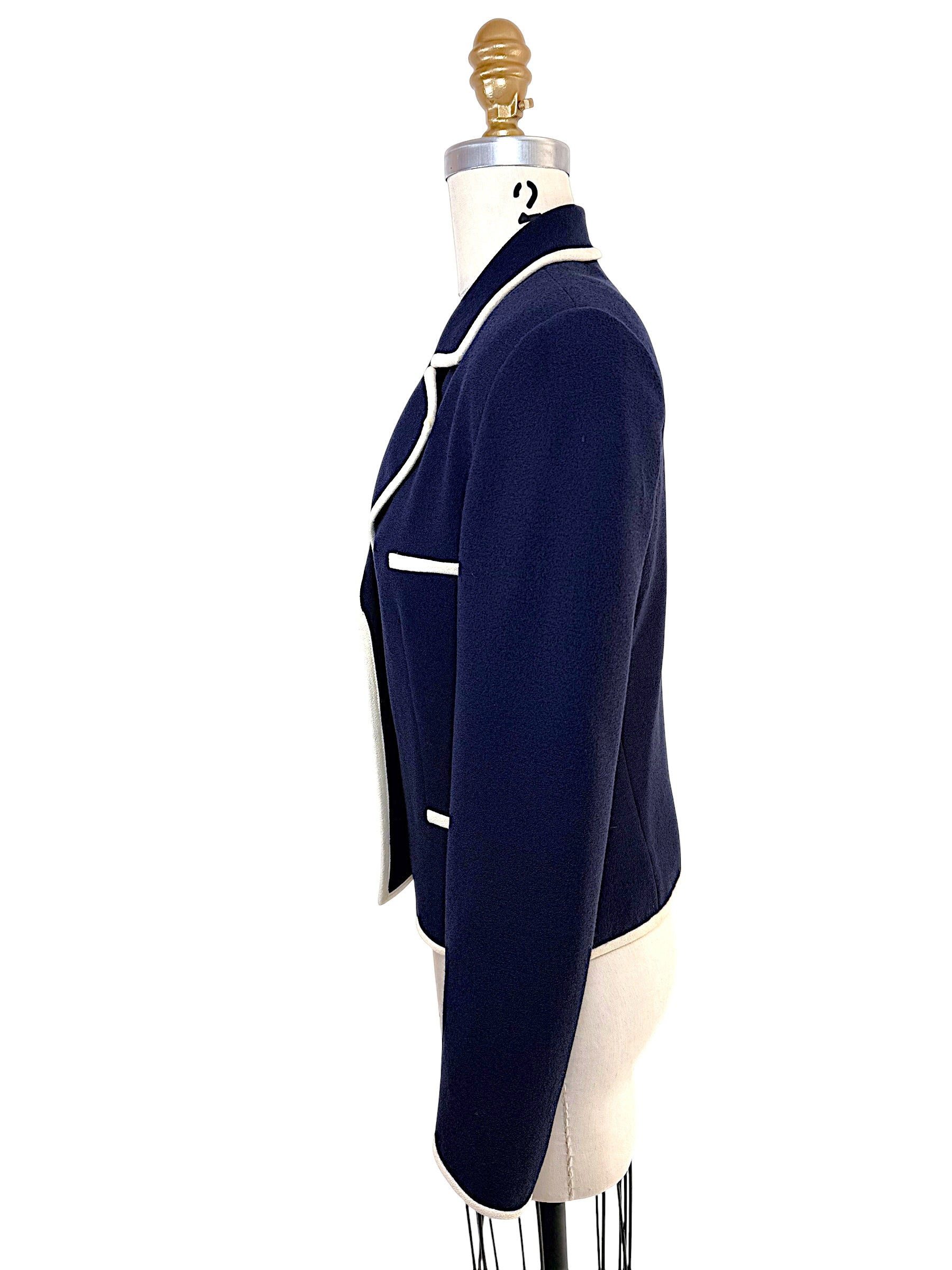Right side view of Valentino navy structured blazer with ivory trim