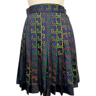 Front view of Versace Fall Winter 2021 La Greca pleated skirt featuring a multicolor geometric Greek Key print and black hem on a US size 2 mannequin.