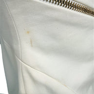 Condition detail showing minor localized soiling near zipper on Versace Spring 2009 ivory dress