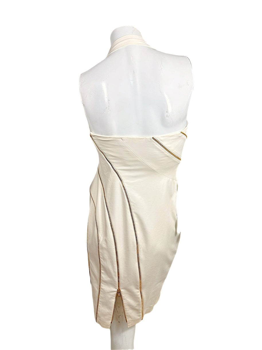 Back view of Versace Spring 2009 Look 6 ivory dress showing exposed gold zipper detailing and back vent