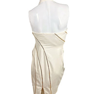 Back view of Versace Spring 2009 Look 6 ivory dress showing exposed gold zipper detailing and back vent