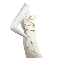 Side view of Versace Spring 2009 Look 6 ivory halter dress with exposed gold zipper construction