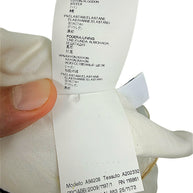 Composition and garment identification label for Versace Spring 2009 ivory dress showing cotton elastane fabric and rayon lining
