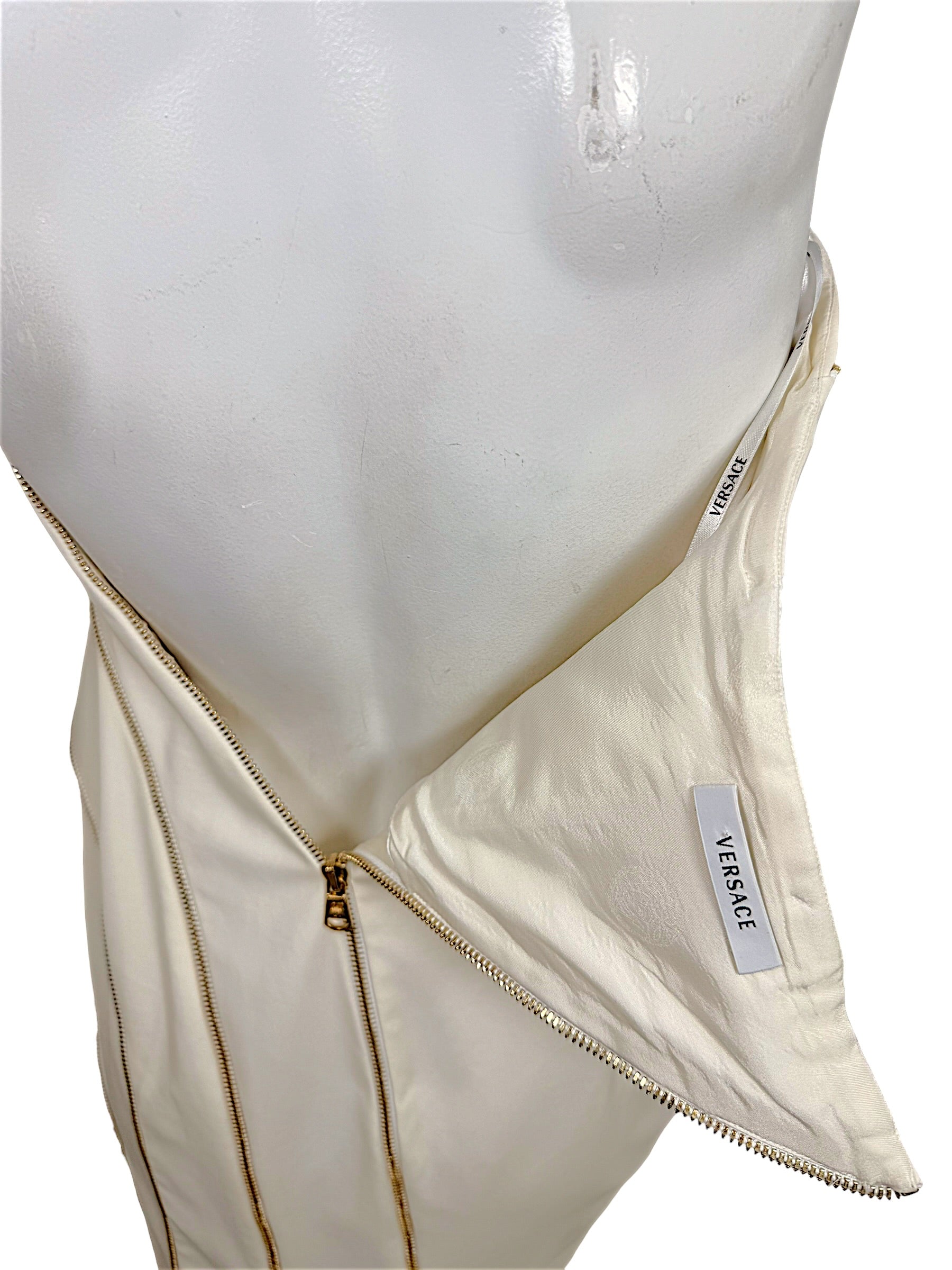Interior Versace label and construction detail on Spring 2009 ivory runway documented dress