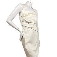 Versace Spring Summer 2009 Look 6 ivory fitted dress with sculptural neckline and gold zippers, angled front view