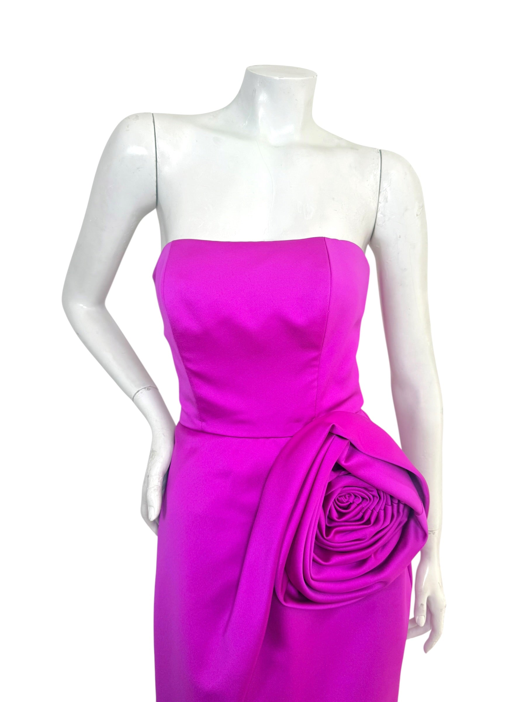 Close-up of strapless bodice on vintage Victor Costa fuchsia formal gown
