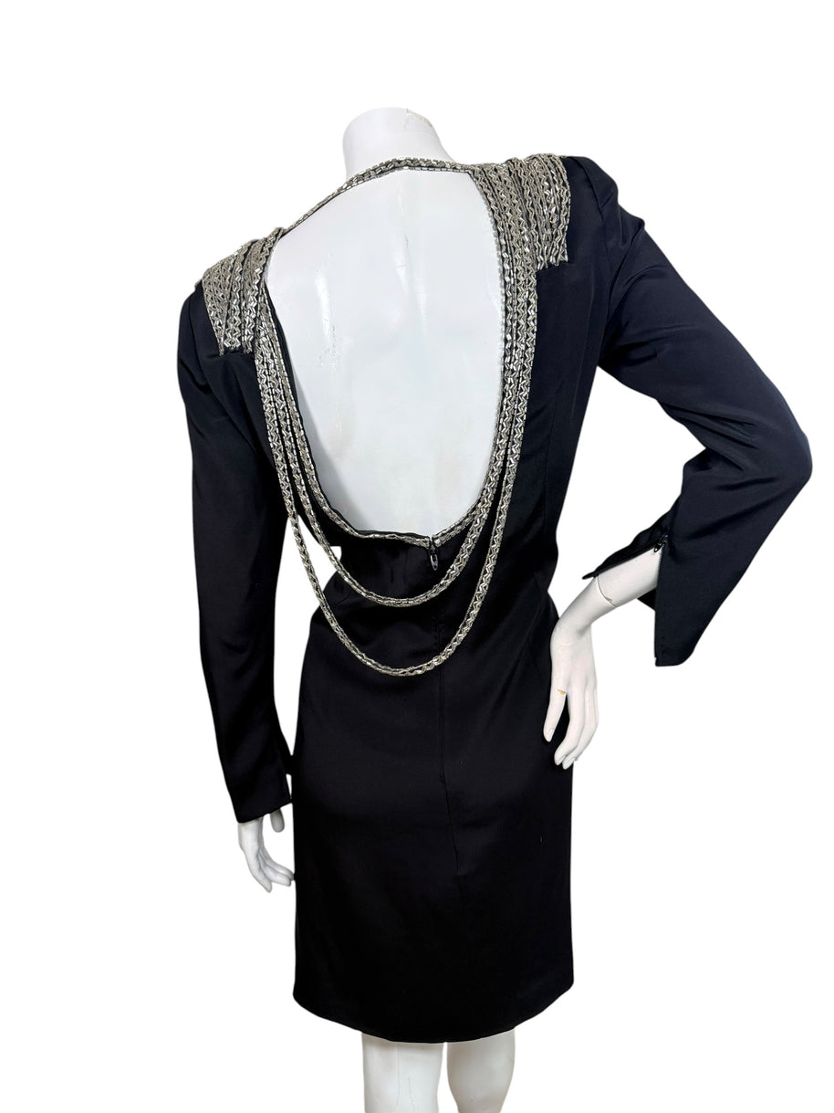 Full back view of vintage 1980s Bob Mackie black dress with dramatic open back and cascading silver bugle bead embellishment