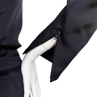 Close-up of concealed zipper sleeve cuff on vintage Bob Mackie black evening dress