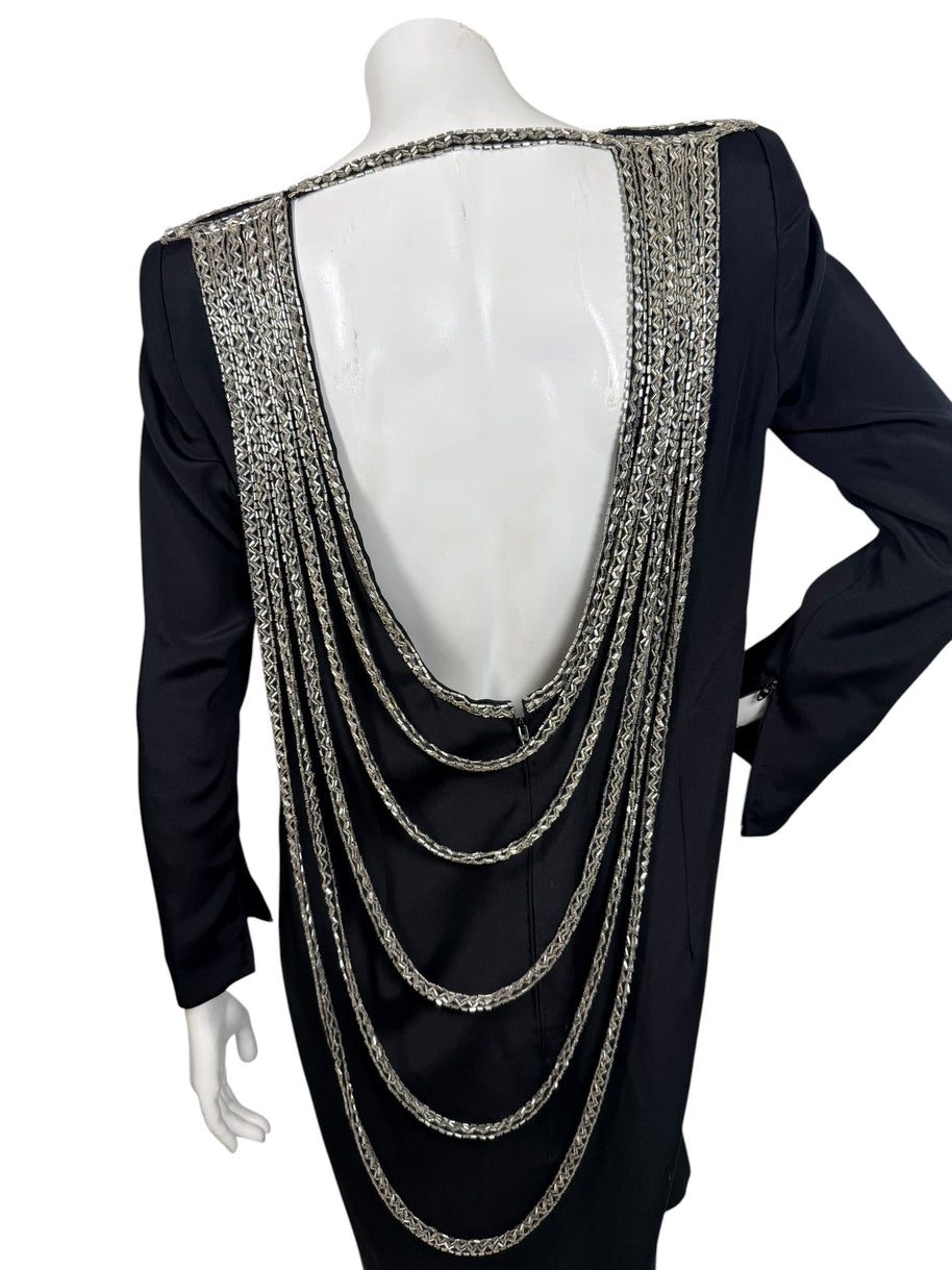 Back view of vintage 1980s Bob Mackie dress with dramatic open back and cascading silver bugle bead strands