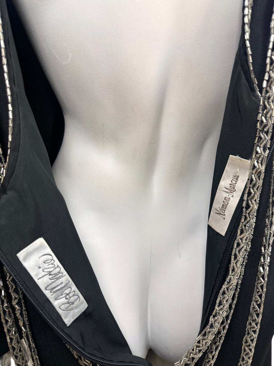 Close-up of Bob Mackie and Neiman Marcus labels inside vintage black silver beaded evening dress