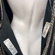 Close-up of Bob Mackie and Neiman Marcus labels inside vintage black silver beaded evening dress