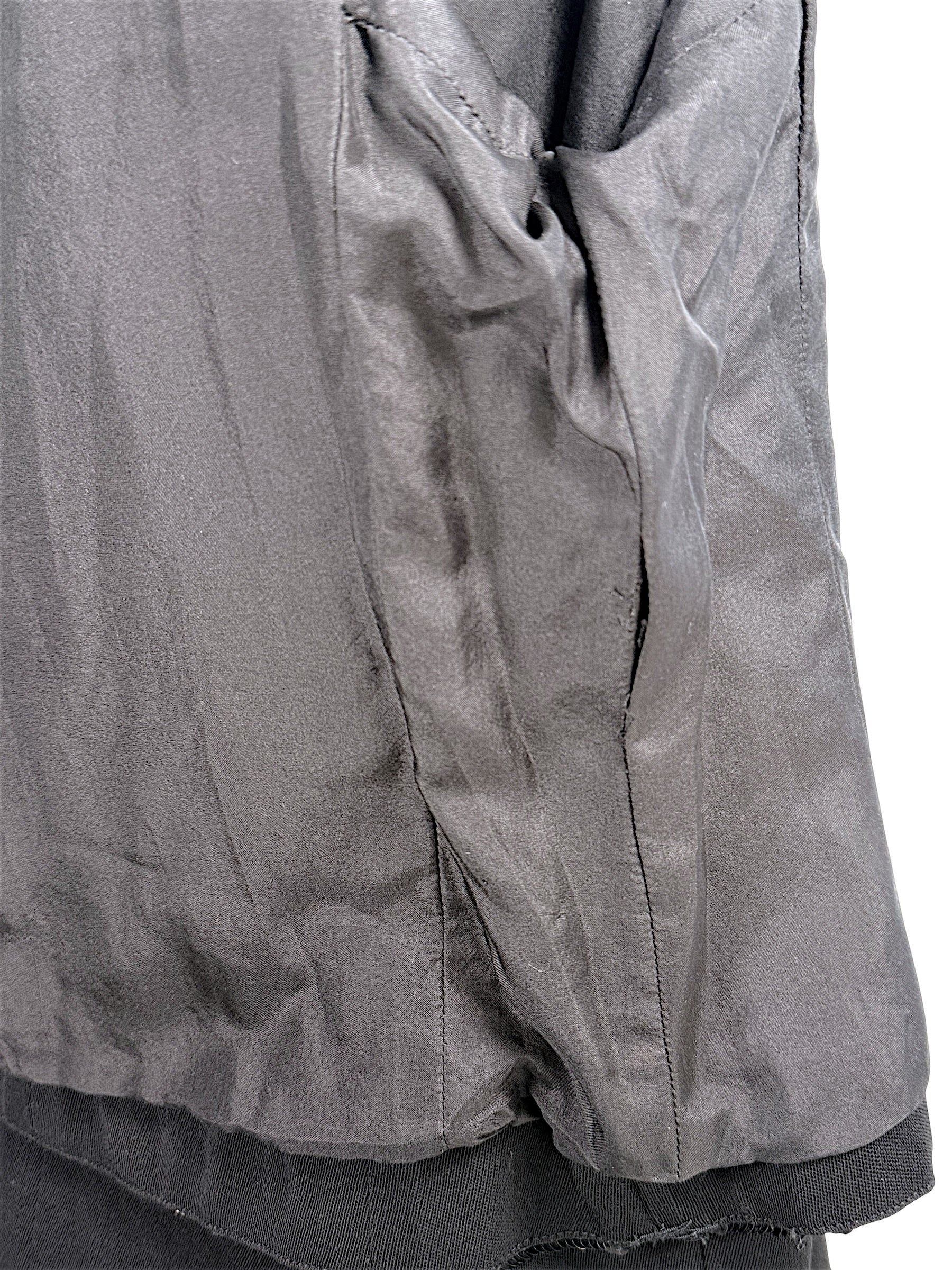 Interior Chanel jacket lining detail showing loose threading and stitching noted in condition description
