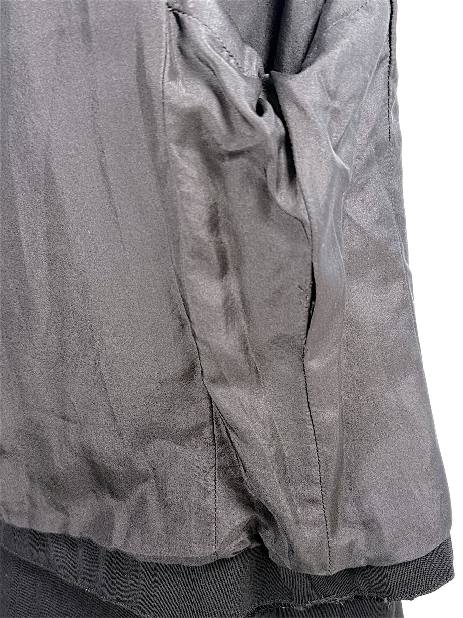 Interior Chanel jacket lining detail showing loose threading and stitching noted in condition description
