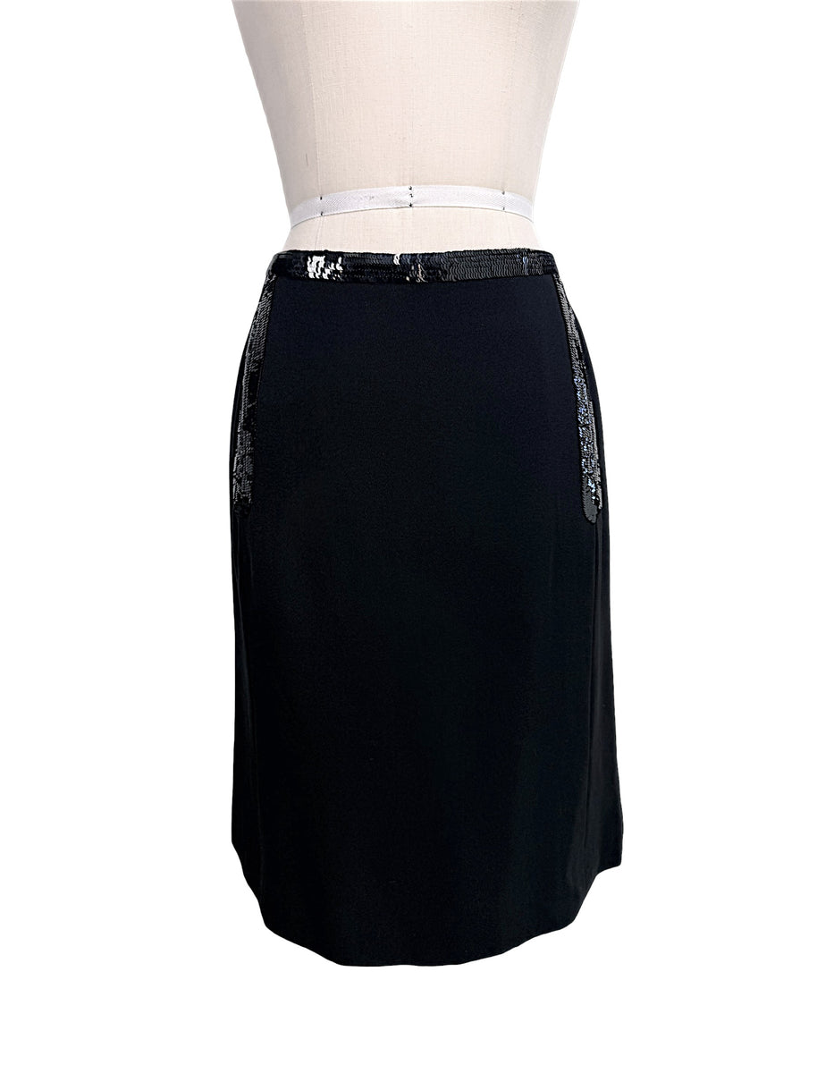 Front view of vintage Chanel black skirt featuring tonal sequined trim detailing