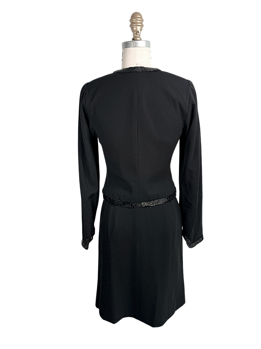 Back view of vintage Chanel black jacket and skirt set with tonal sequin trim details