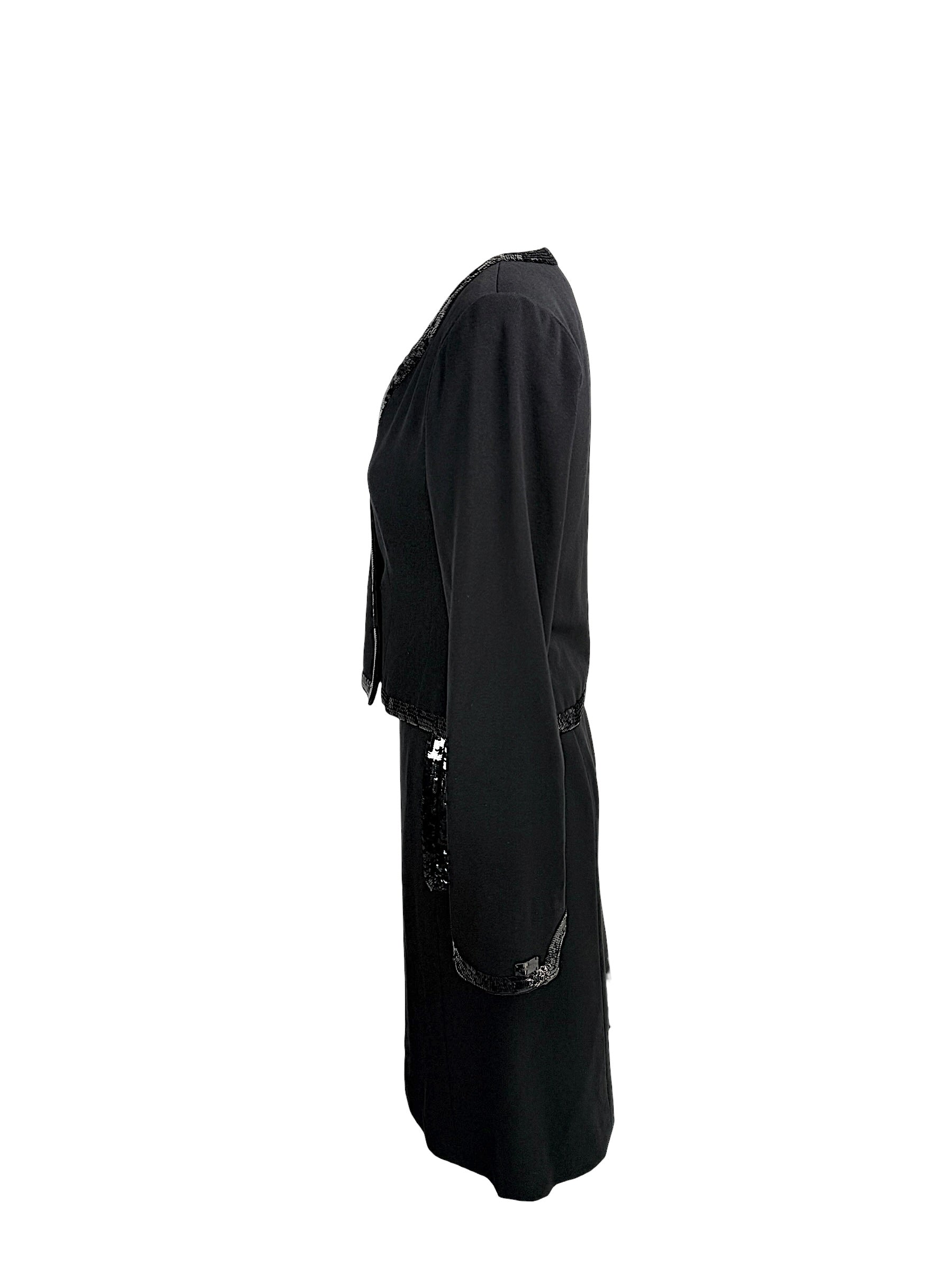 Left side profile of vintage Chanel black skirt suit set with tonal sequin embellishment