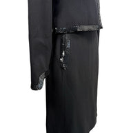 Close side detail of vintage Chanel black skirt with tonal sequined trim accents