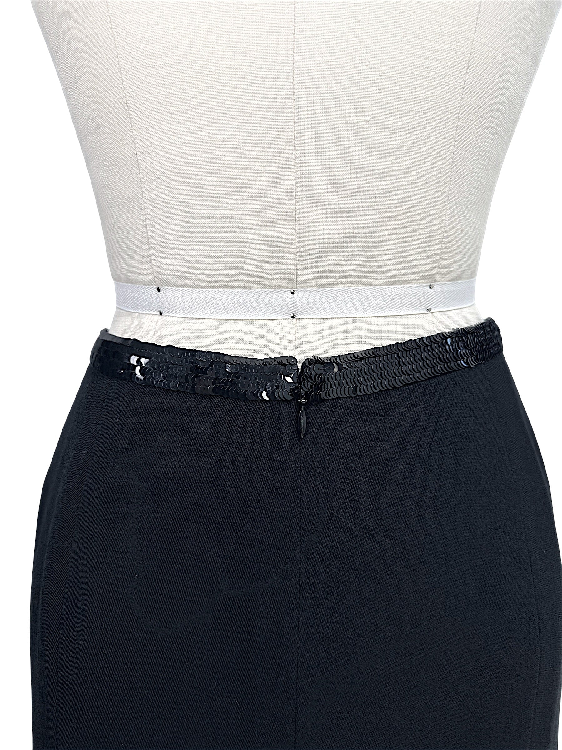 Close detail of Chanel skirt sequined waistband and rear zipper closure