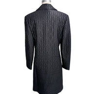 Rear view of vintage Guy Laroche Paris Collection black geometric quilted longline jacket.