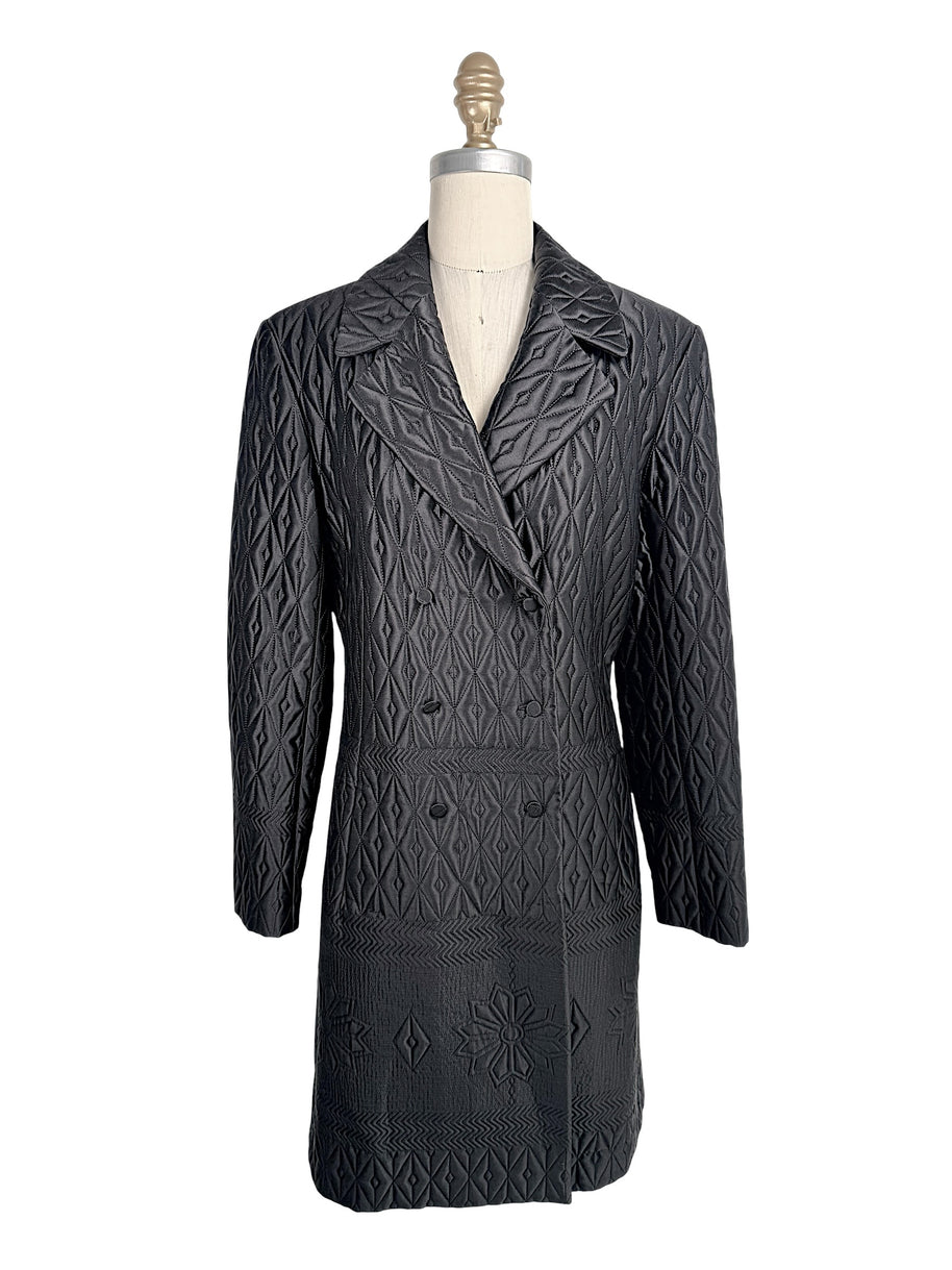 Vintage Guy Laroche Paris Collection black quilted longline double-breasted jacket with geometric stitched pattern front view.