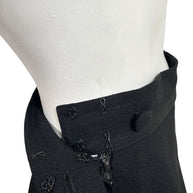 Interior construction of vintage Sonia Rykiel Paris trousers showing original hook-and-eye closures and concealed zipper.