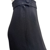 Close-up of the waist button and concealed side zipper closure on vintage Sonia Rykiel Paris black trousers.