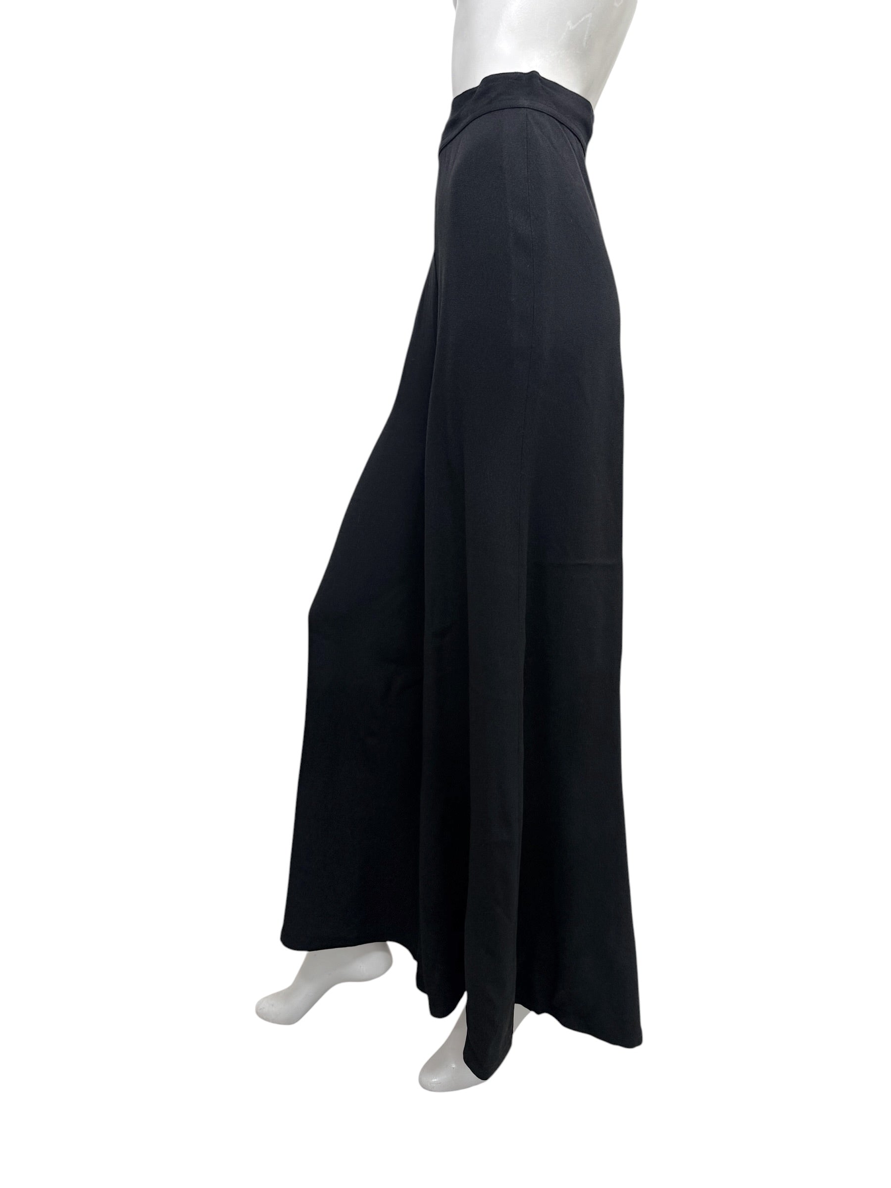 Right profile of vintage Sonia Rykiel Paris black wide leg trousers emphasizing the elegant drape and elongated proportions.