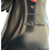 Yves Saint Laurent black leather boots Made in Italy and size 39 interior markings